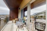 Extended balcony provides views of both mountains and lake